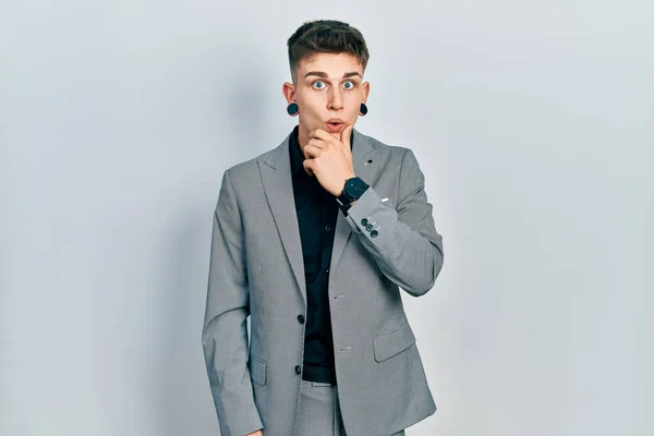 Young Caucasian Boy Ears Dilation Wearing Business Jacket Looking Fascinated — Stock Photo, Image