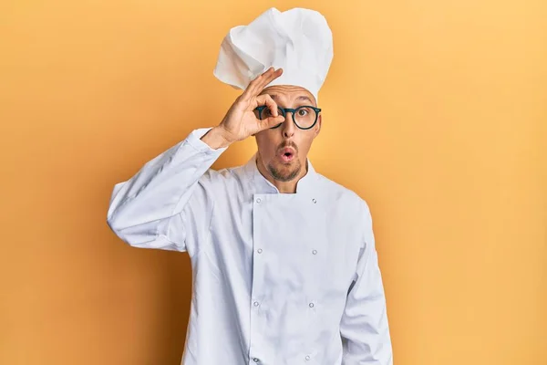 Bald Man Beard Wearing Professional Cook Uniform Doing Gesture Shocked — Stock Photo, Image