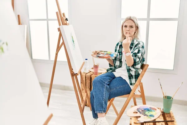 Young Artist Woman Painting Canvas Art Studio Showing Middle Finger — Stock Photo, Image