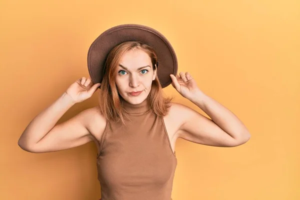 Young Caucasian Woman Wearing Hat Skeptic Nervous Frowning Upset Because — Stock Photo, Image
