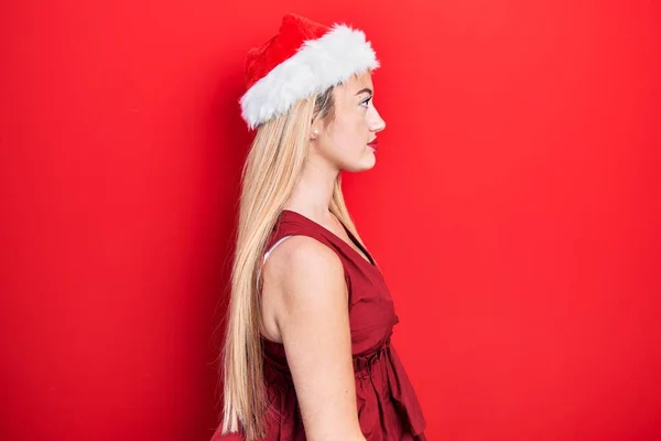 Chica Rubia Joven Con Sombrero Navidad Mirando Lado Pose Perfil —  Fotos de Stock