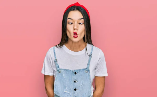 Young Hispanic Girl Wearing Casual Clothes Making Fish Face Lips — Stock Photo, Image