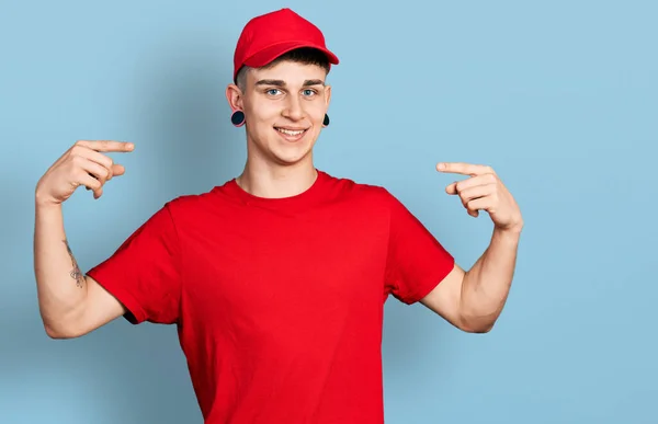 Young Caucasian Boy Ears Dilation Wearing Delivery Uniform Cap Looking — Stock Photo, Image