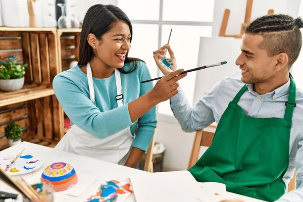 Young Latin Painter Couple Smiling Happy Painting Face Sitting Table — Stock Photo, Image