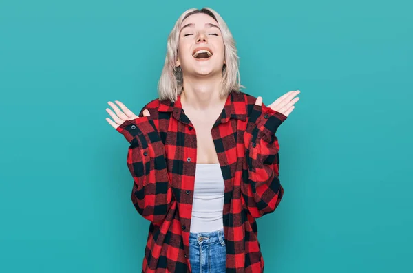 Young Blonde Girl Wearing Casual Clothes Celebrating Mad Crazy Success — Stock Photo, Image