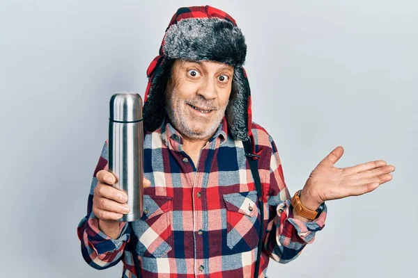 Handsome Mature Handyman Wearing Winter Hat Ear Flaps Holding Thermo — Stock Photo, Image