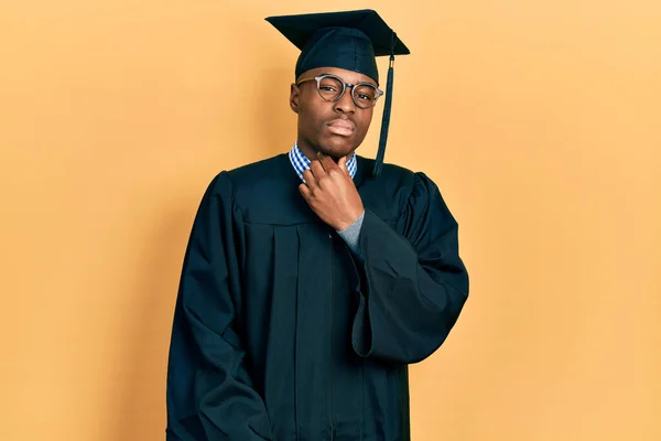 Young African American Man Wearing Graduation Cap Ceremony Robe Touching — Stock Photo, Image