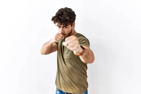 Hispanic Man Standing Isolated White Background Punching Fist Fight Aggressive — Stock Photo, Image