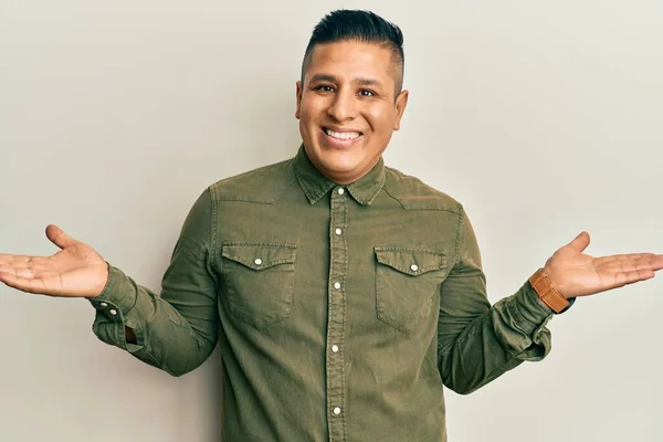 Young Latin Man Wearing Casual Clothes Smiling Showing Both Hands — Stock Photo, Image