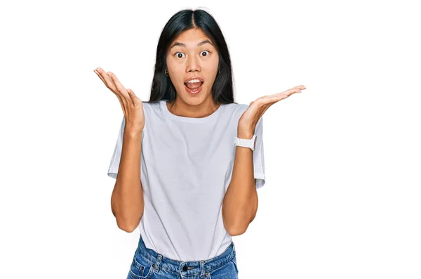 Beautiful Young Asian Woman Wearing Casual White Shirt Celebrating Crazy — Foto Stock