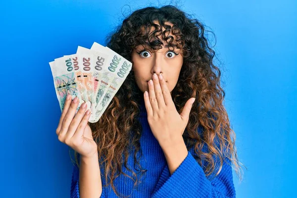 Young Hispanic Girl Holding Czech Koruna Banknotes Covering Mouth Hand — Stock Photo, Image