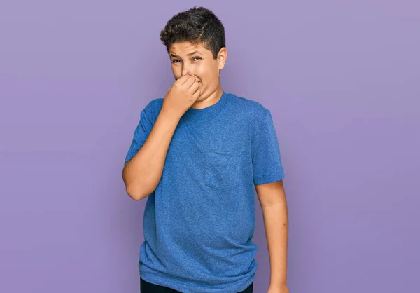 Teenager Hispanic Boy Wearing Casual Clothes Smelling Something Stinky Disgusting — Stock Photo, Image