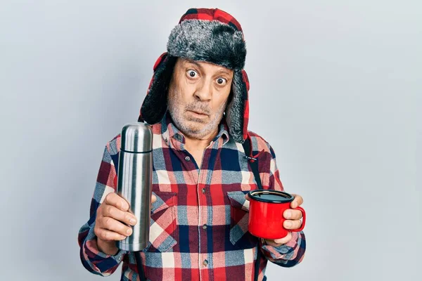 Handsome Mature Handyman Wearing Winter Hat Ear Flaps Drinking Hot — Stock Photo, Image