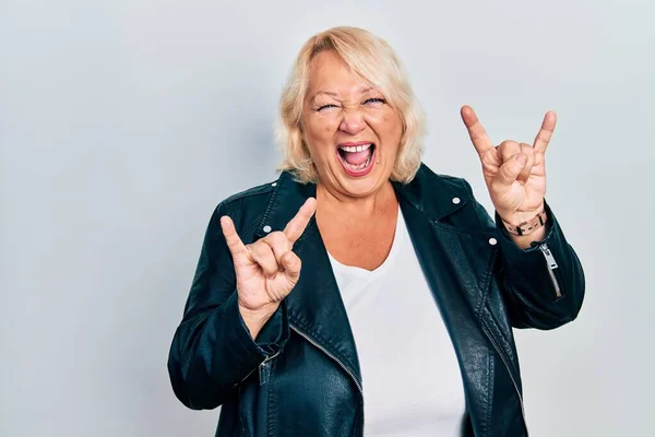 Middle Age Blonde Woman Wearing Leather Jacket Shouting Crazy Expression — Stock Photo, Image