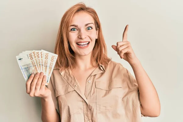 Young Caucasian Woman Holding 100 Danish Krone Banknotes Smiling Idea — Foto de Stock