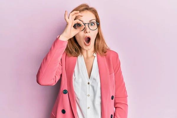 Young Caucasian Woman Wearing Business Style Glasses Doing Gesture Shocked — Stock Photo, Image