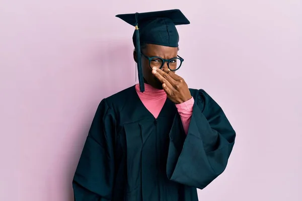 Young African American Girl Wearing Graduation Cap Ceremony Robe Smelling — Stock Photo, Image