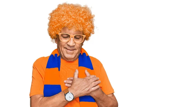 Senior Hispanic Man Football Hooligan Cheering Game Smiling Hands Chest — Stock Photo, Image