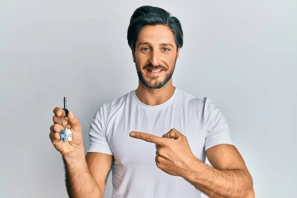 Young Hispanic Man Holding Keys New Home Smiling Happy Pointing — Stock Photo, Image