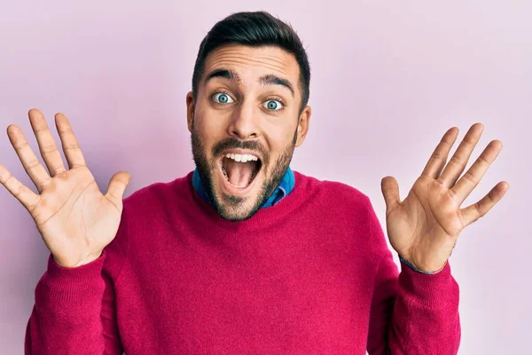 Young Hispanic Man Wearing Casual Clothes Celebrating Crazy Amazed Success — Stock Photo, Image