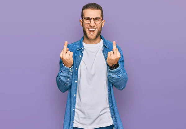 Young Caucasian Man Wearing Casual Clothes Showing Middle Finger Doing — Stock Photo, Image