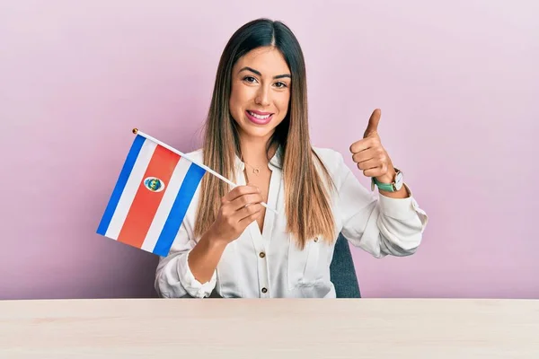Young Hispanic Woman Holding Costa Rica Flag Sitting Table Smiling — 스톡 사진
