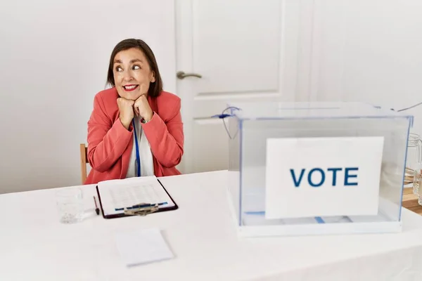 Beautiful Middle Age Hispanic Woman Political Election Sitting Ballot Laughing — Stock Photo, Image
