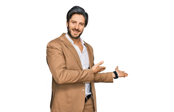 Young Hispanic Man Wearing Business Clothes Inviting Enter Smiling Natural — Stock Photo, Image