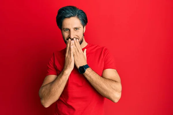 Young Hispanic Man Wearing Casual Red Shirt Laughing Embarrassed Giggle — Stock Photo, Image