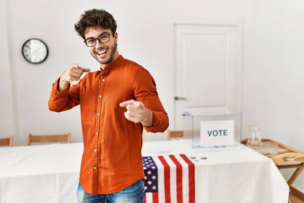 Hispanic Man Standing Election Room Pointing Fingers Camera Happy Funny — Stock Photo, Image