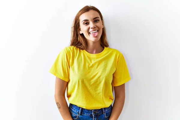 Young Brunette Woman Standing Isolated Background Sticking Tongue Out Happy — Stock Photo, Image