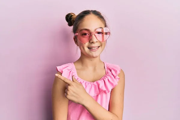 Beautiful Brunette Little Girl Wearing Heart Shaped Sunglasses Smiling Cheerful — Stock Photo, Image