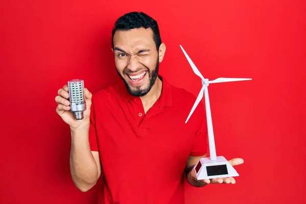 Hispanic Man Beard Holding Solar Windmill Renewable Electricity Led Bulb — Stock Photo, Image