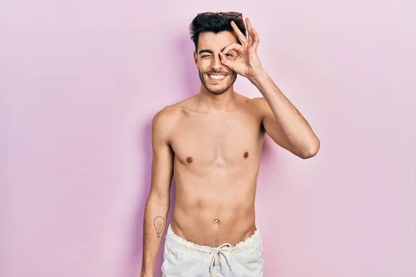 Young Hispanic Man Wearing Swimwear Shirtless Doing Gesture Hand Smiling — Stock Photo, Image