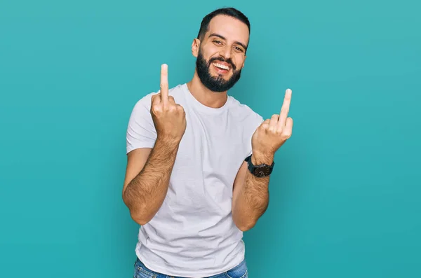 Young Man Beard Wearing Casual White Shirt Showing Middle Finger — Foto Stock