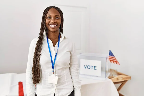 Young african american politic party worker standing at electoral college