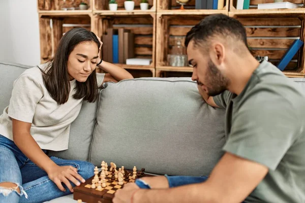Young Latin Couple Smiling Happy Playing Chess Home — Stock Photo, Image