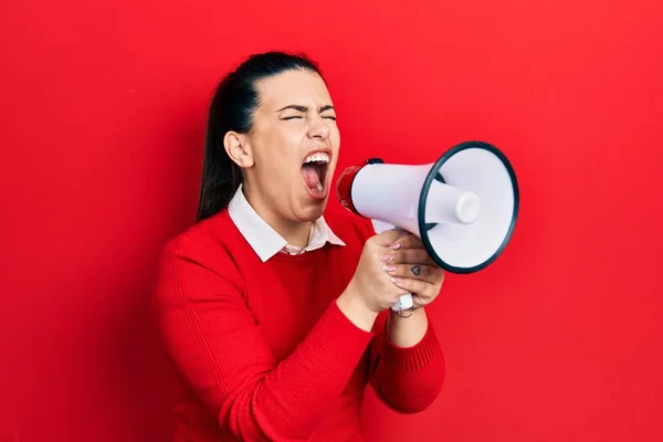 Young Brunette Woman Screaming Megaphone Isolated Red Background — ストック写真