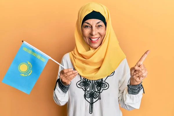 Middle Age Hispanic Woman Wearing Hijab Holding Kazakhstan Flag Smiling — Stock Photo, Image