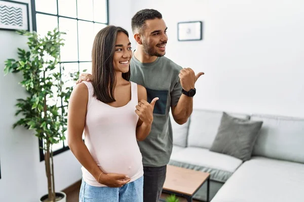 Young Interracial Couple Expecting Baby Touching Pregnant Belly Smiling Happy — Stock Photo, Image