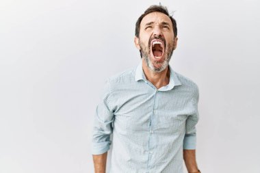 Orta yaşlı, sakallı, öfkeli ve öfkeli bir şekilde bağıran öfkeli bir adam. Öfkeyle bağırıyor. öfke ve agresif konsept. 