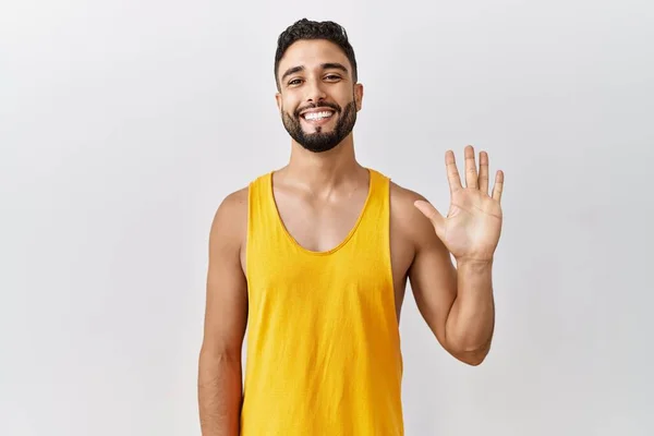 Jovem Homem Bonito Com Barba Sobre Fundo Isolado Mostrando Apontando — Fotografia de Stock