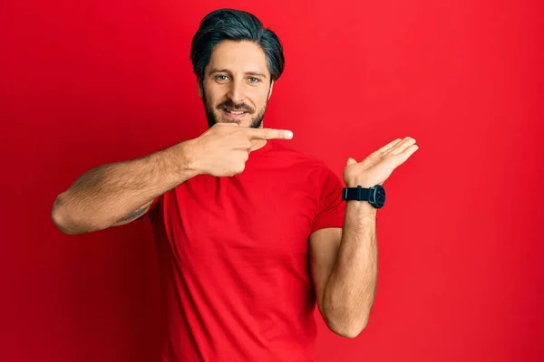 Young Hispanic Man Wearing Casual Red Shirt Amazed Smiling Camera — Stock Photo, Image