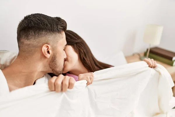 Young Hispanic Couple Lying Bed Covering Bed Sheet Home — Stock Photo, Image