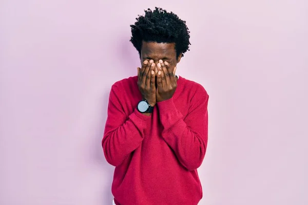 Young african american man wearing casual clothes rubbing eyes for fatigue and headache, sleepy and tired expression. vision problem