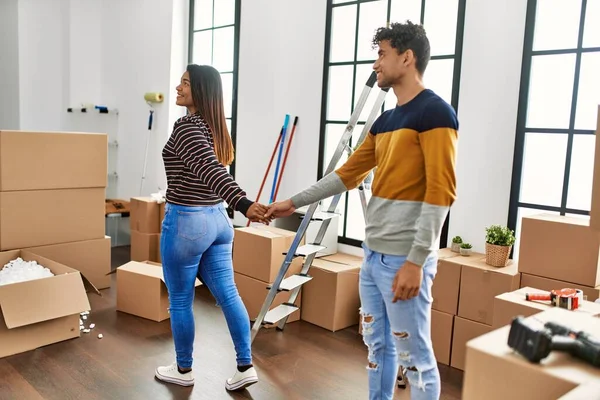 Young Latin Couple Smiling Happy Standing Hands Together New Home — Stock Photo, Image