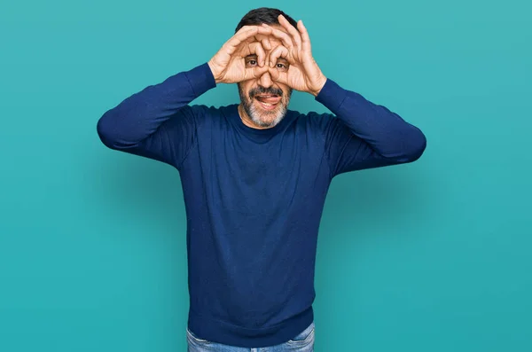 Middle Age Hispanic Man Wearing Casual Clothes Doing Gesture Binoculars — Stock Photo, Image