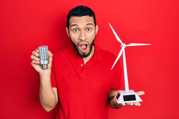 Hispanic Man Beard Holding Solar Windmill Renewable Electricity Led Bulb — Stock Photo, Image