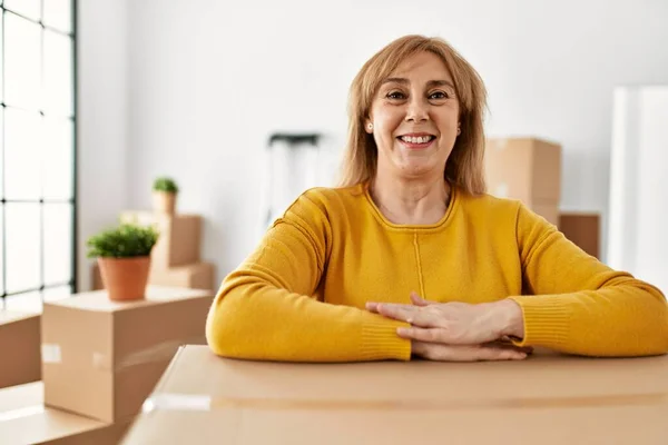 Middle Age Blonde Woman Smiling Happy Leaning Cardboard Box New — Stock Photo, Image