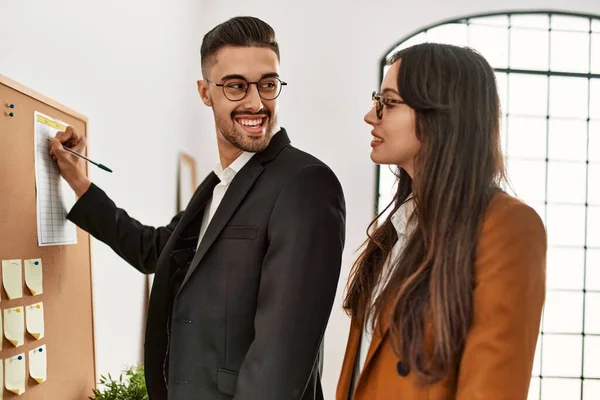 Two Business Workers Smiling Happy Writing Corkboard Reminder Office — Stock Photo, Image